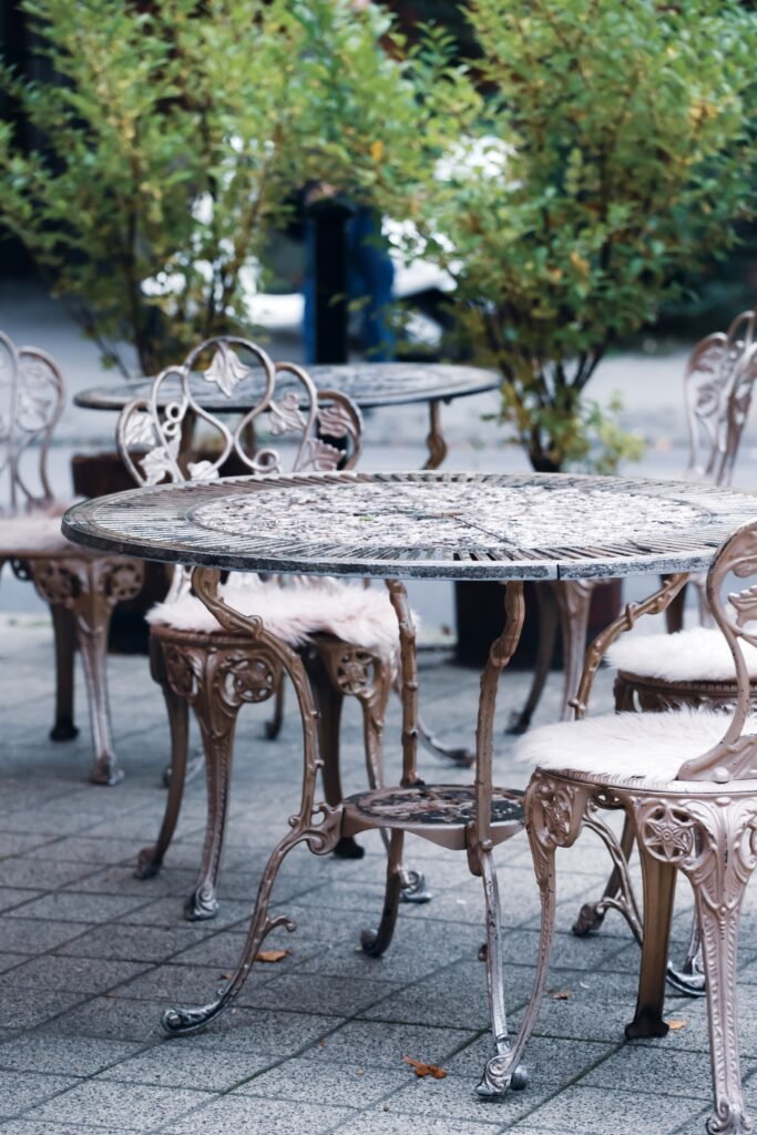 Outdoor café tables in Budapest in an atmospheric autumn street setting