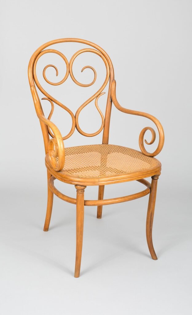 Antique Michael Thonet wooden armchair with curved frame and classic nineteenth-century design